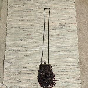 Cute night time purse. No name.